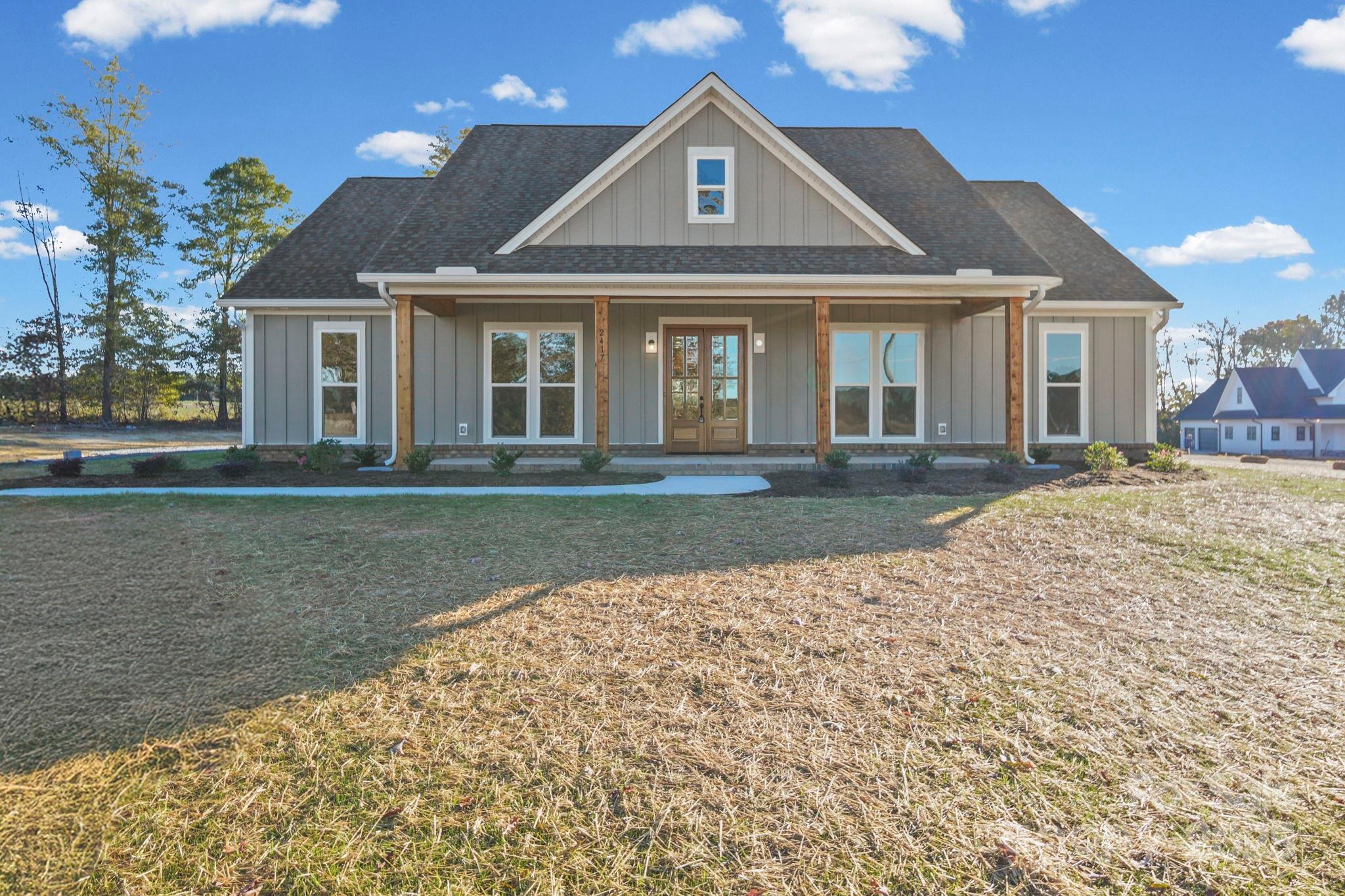 2417 Plyler Mill Road Monroe, NC 28112 - Photo 1 of 34 a front view of a house with a yard