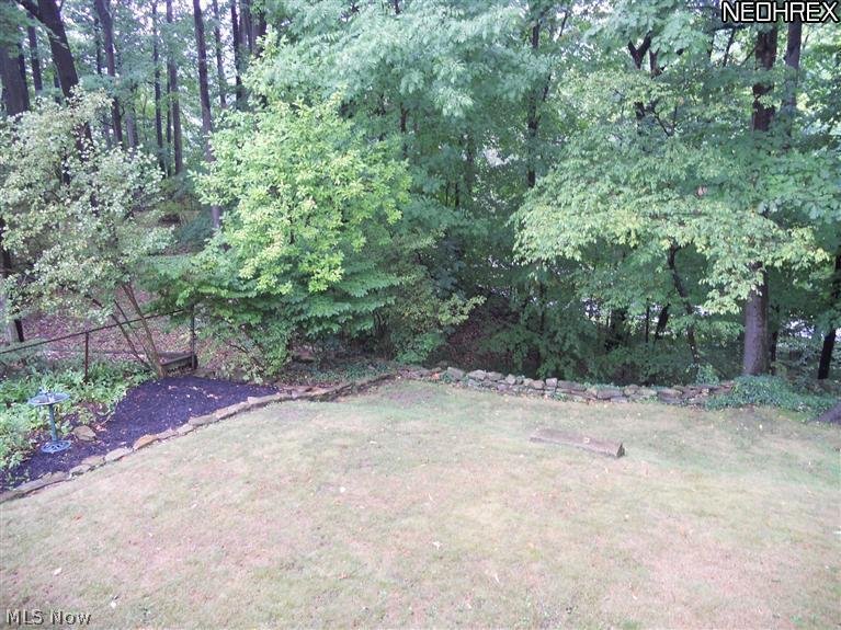 1910 Temblethurst Road South Euclid, OH 44121 - Photo 12 of 13 Beautiful Wooded and Park-like Backyard Dramatic Views from Every Room
