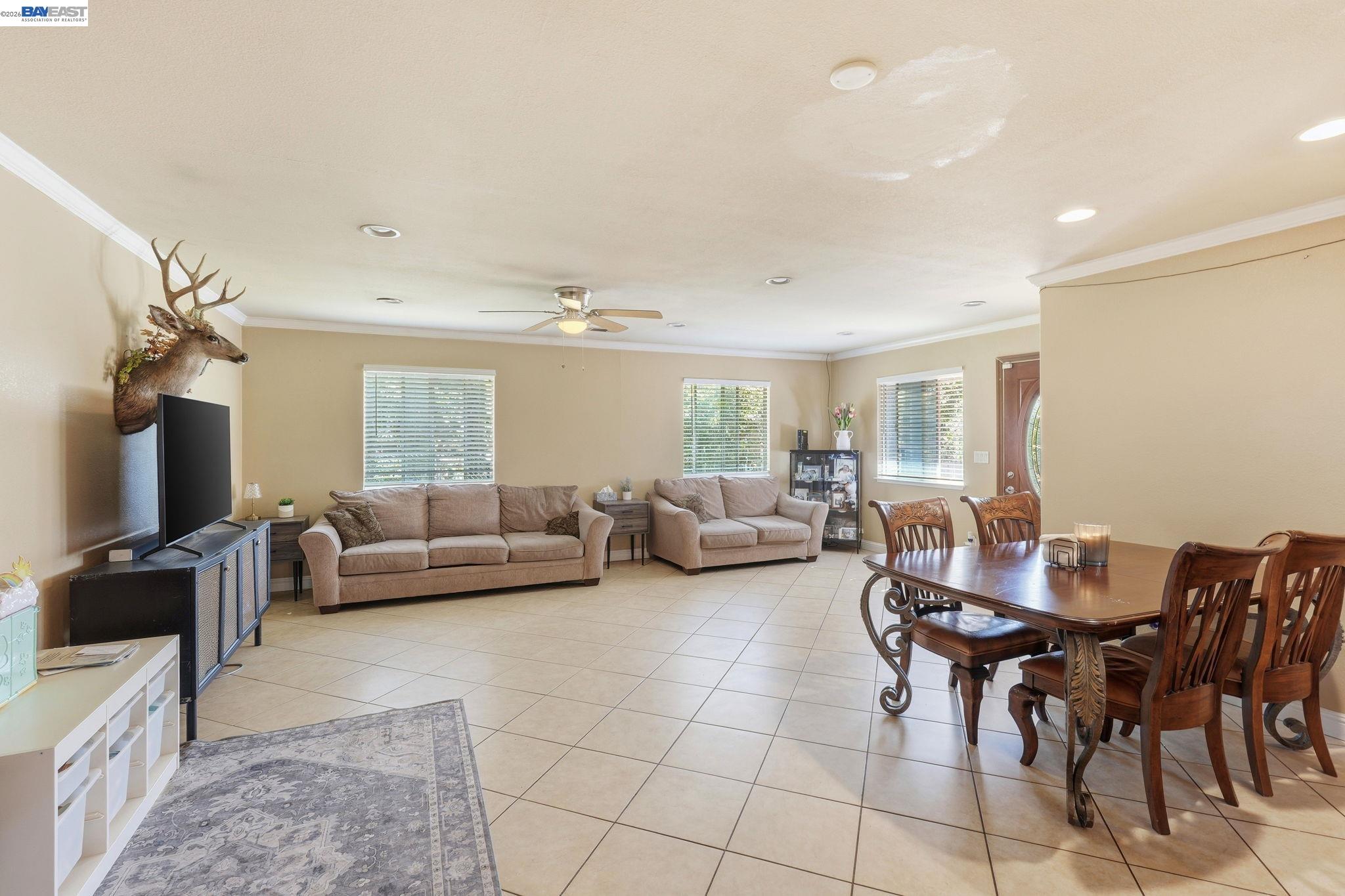 10378 South Priest Road French Camp, CA 95231 - Photo 6 of 44 a living room with furniture and a flat screen tv