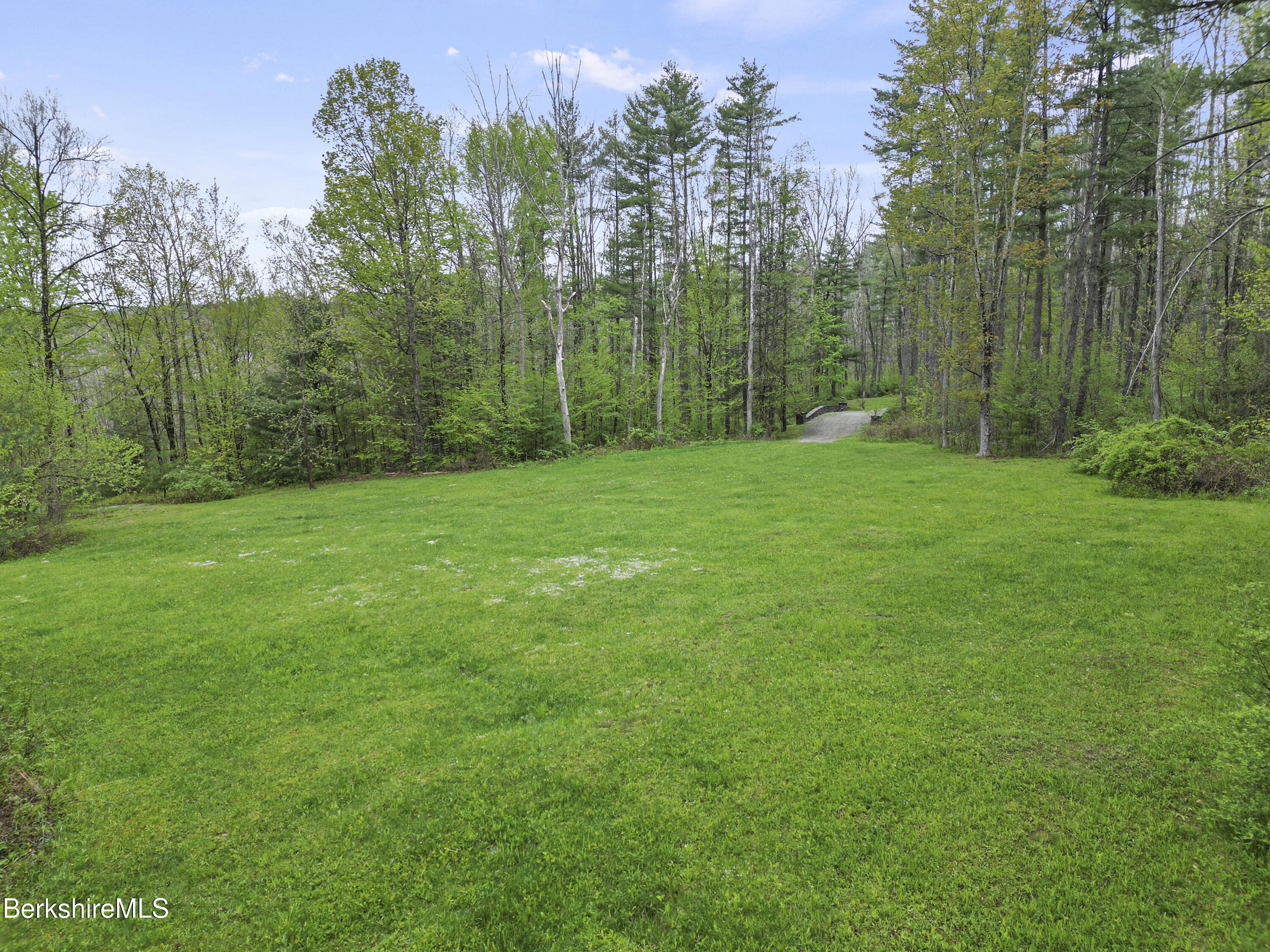 286 Lee Road Lenox, MA 01240 - Photo 15 of 26 a view of a lush green space