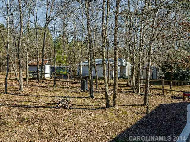 6713 Potter Road Waxhaw, NC 28173 - Photo 16 of 16 a view of a park with swings