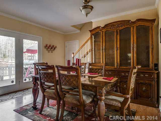 6713 Potter Road Waxhaw, NC 28173 - Photo 7 of 16 a view of a dining room with furniture and window