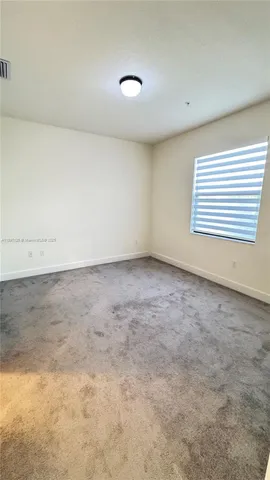 an empty room with a workbench