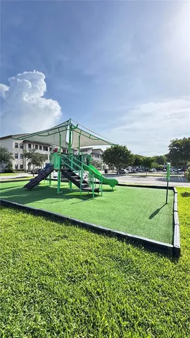 a view of a golf course with a lake