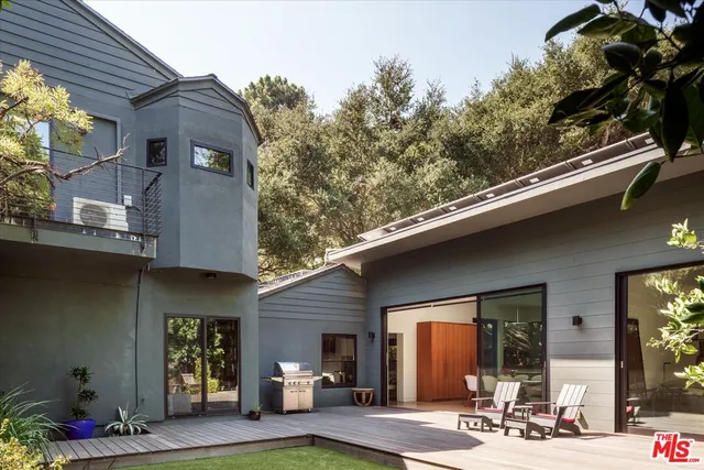 a view of a building with sitting area
