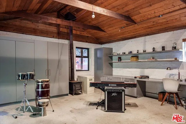 a view of a workspace with furniture