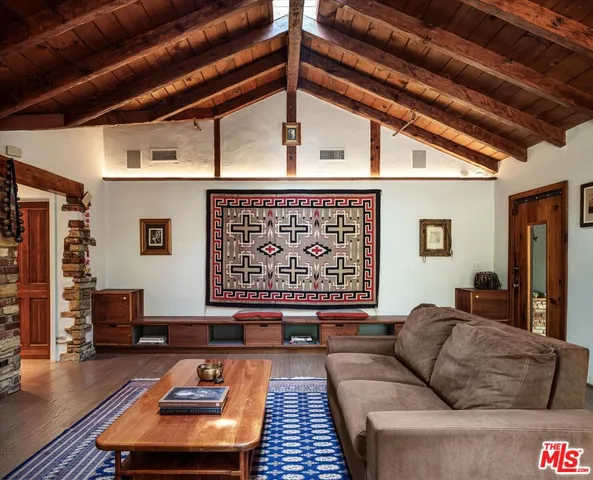 a living room with furniture and a couch
