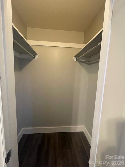 443 17th Street Cramerton, NC 28032 - Photo 14 of 20 a view of walk in closet with empty racks