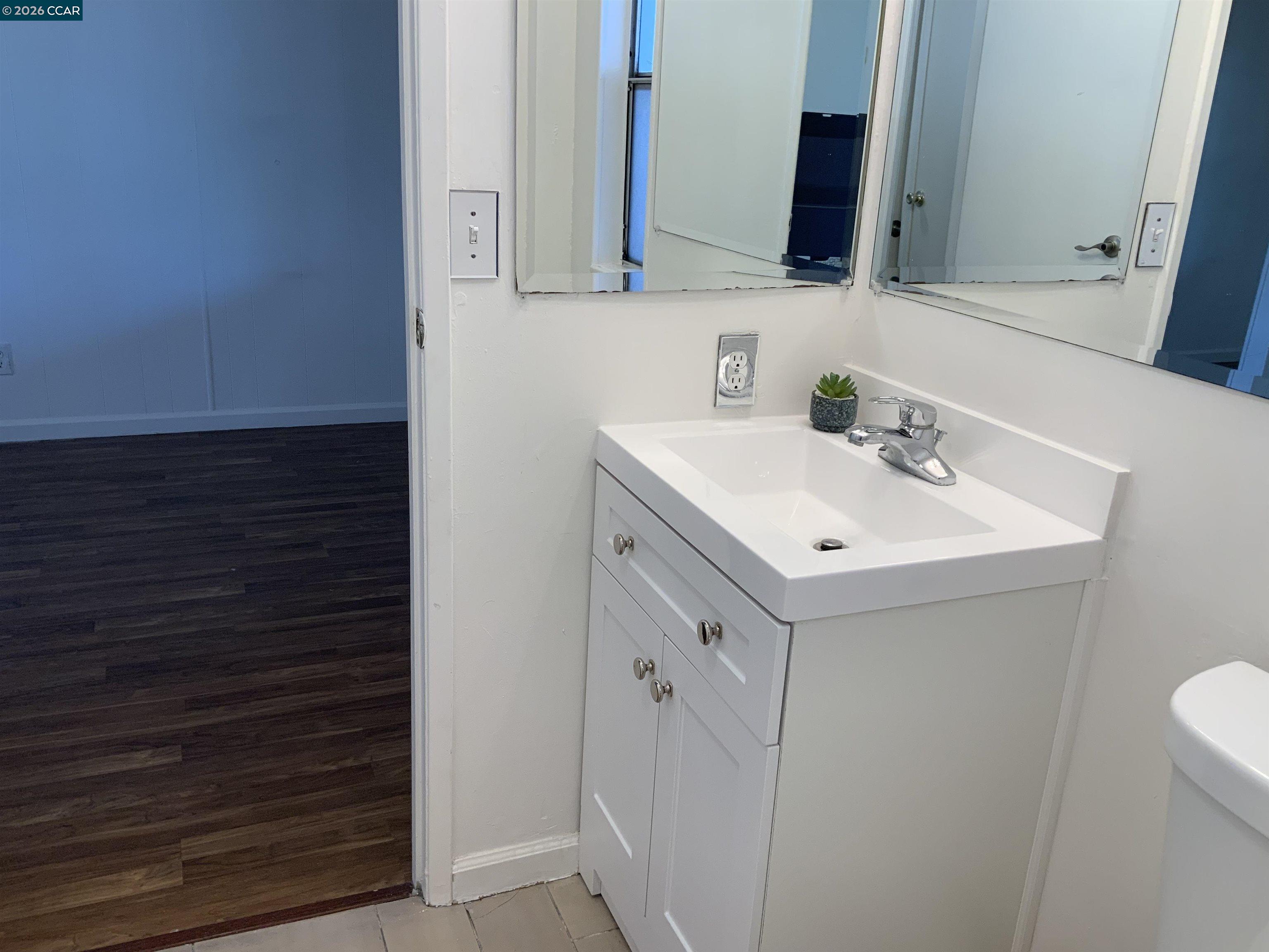 140 Shannon Pittsburg, CA 94565 - Photo 21 of 37 a bathroom with a sink vanity and a mirror