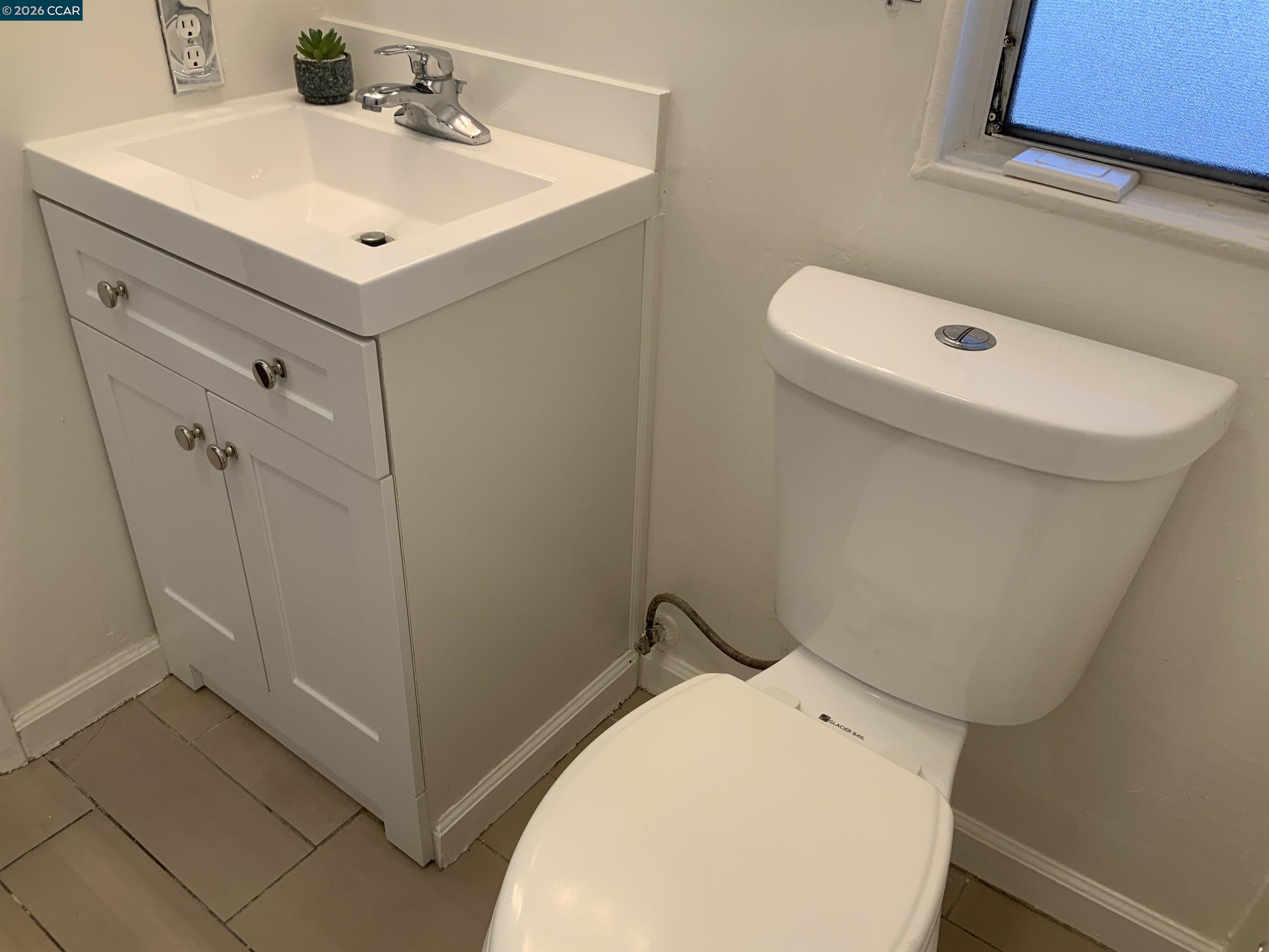 140 Shannon Pittsburg, CA 94565 - Photo 22 of 37 a bathroom with a sink a toilet and shower