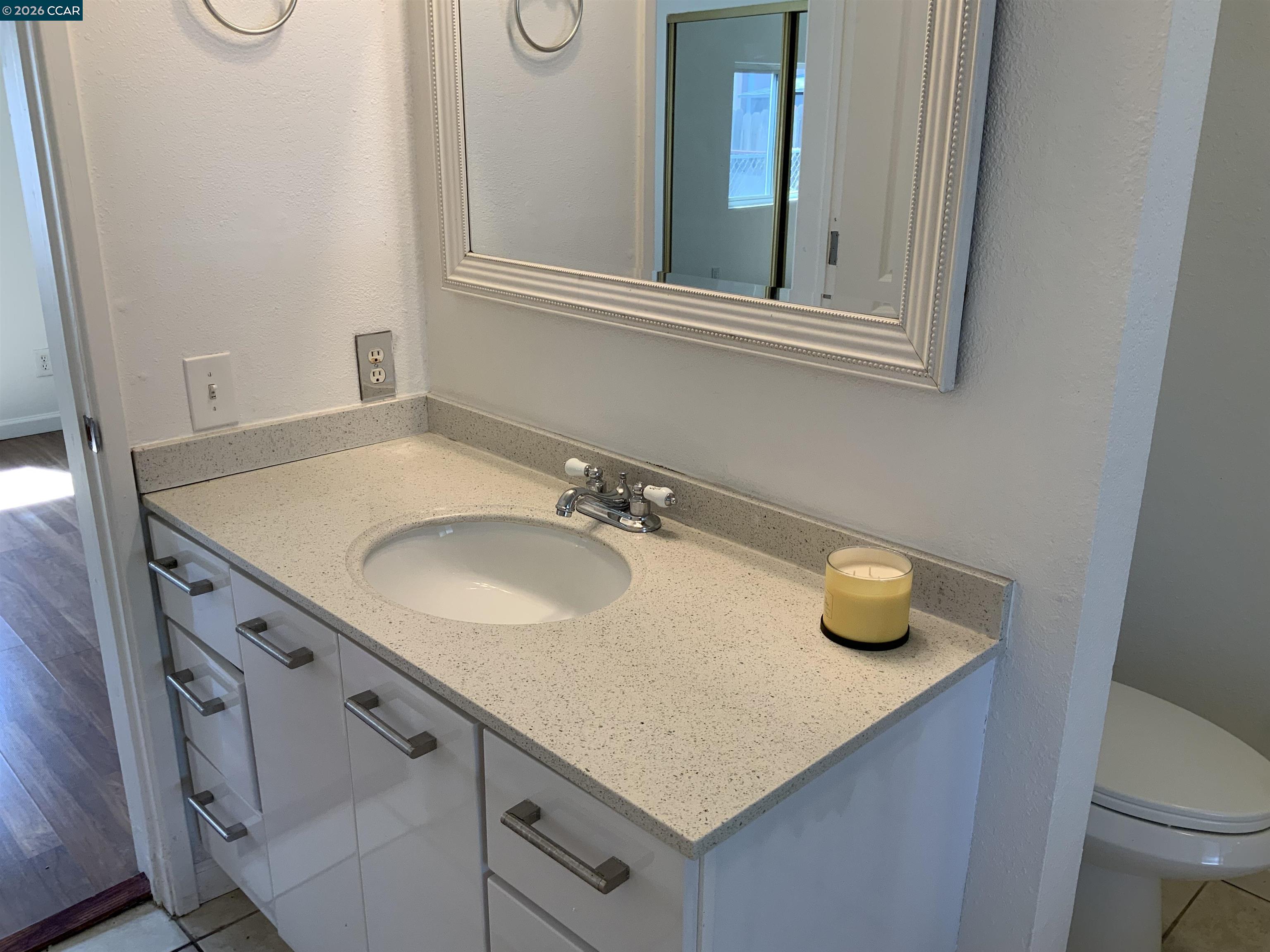 140 Shannon Pittsburg, CA 94565 - Photo 30 of 37 a bathroom with a sink and a toilet