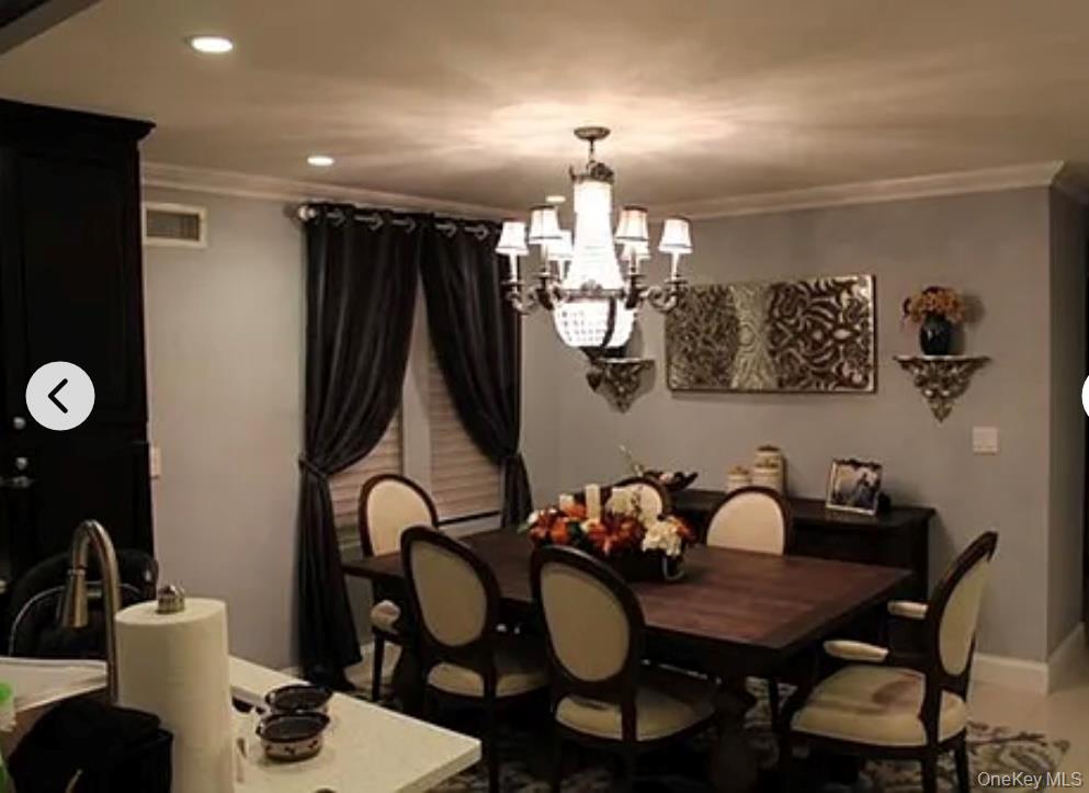 78-45 79th Place Queens, NY 11385 - Photo 12 of 36 a dining room with furniture and view of bathroom
