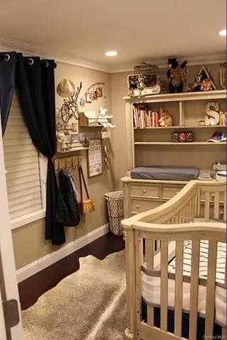 a living room with a fireplace and a flat screen tv