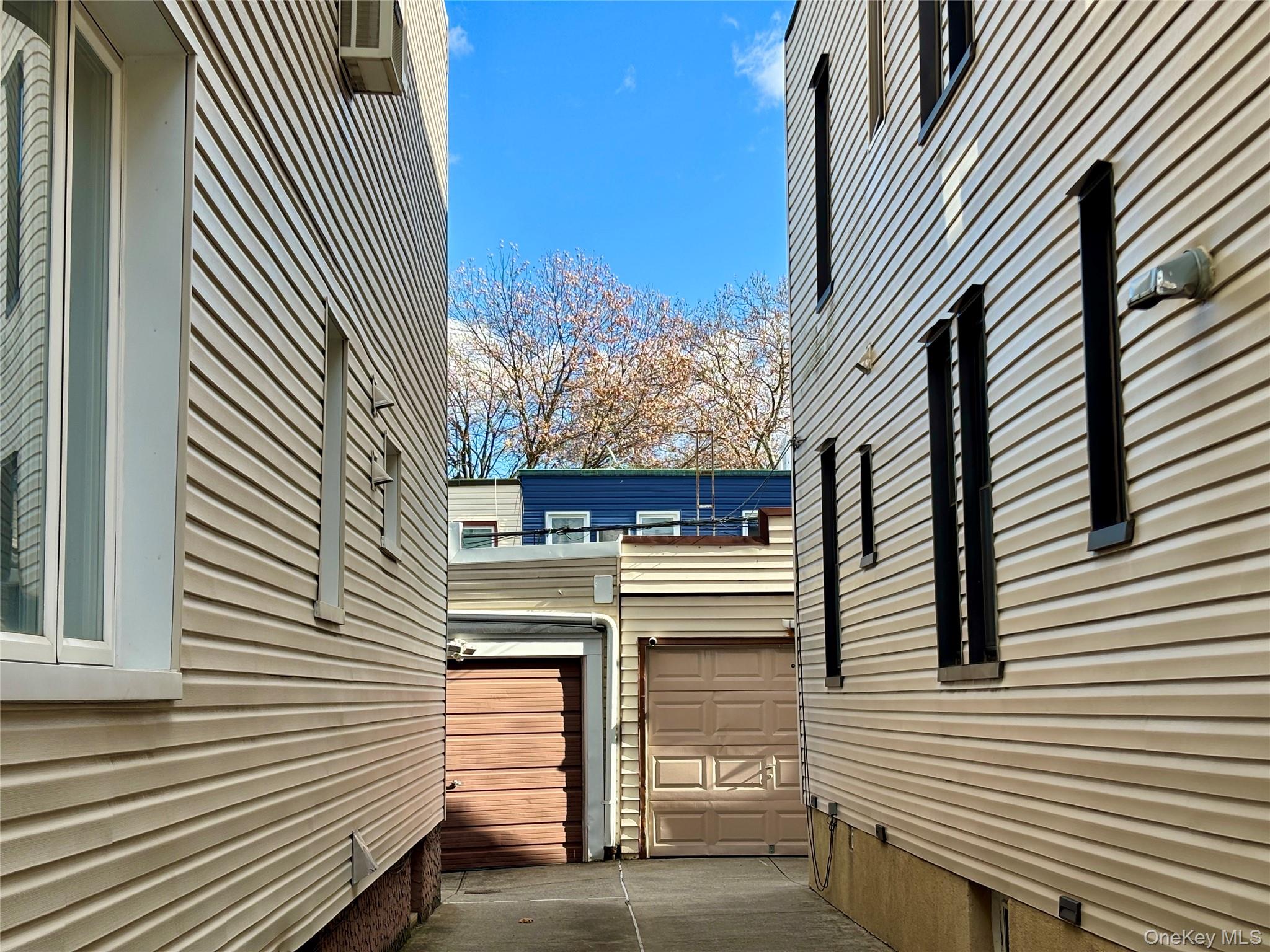 78-45 79th Place Queens, NY 11385 - Photo 2 of 36 a view of a house with a door