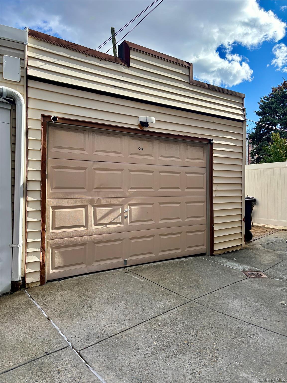 78-45 79th Place Queens, NY 11385 - Photo 3 of 36 a view of a house with a door and a wooden bench