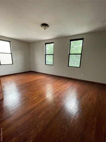 a kitchen with a table and chairs in it