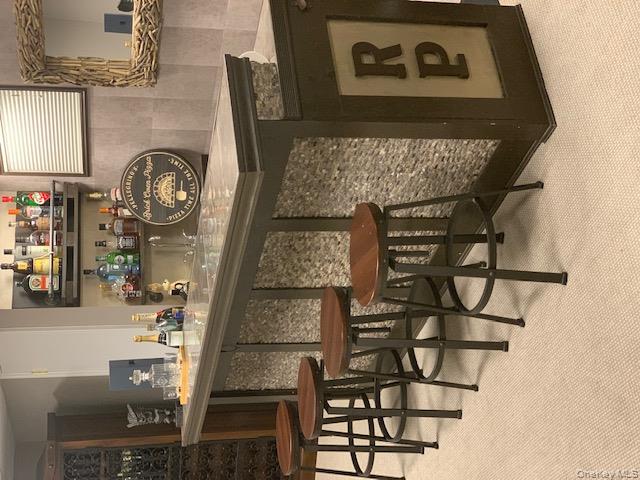 78-45 79th Place Queens, NY 11385 - Photo 36 of 36 a kitchen with a table and chairs in it