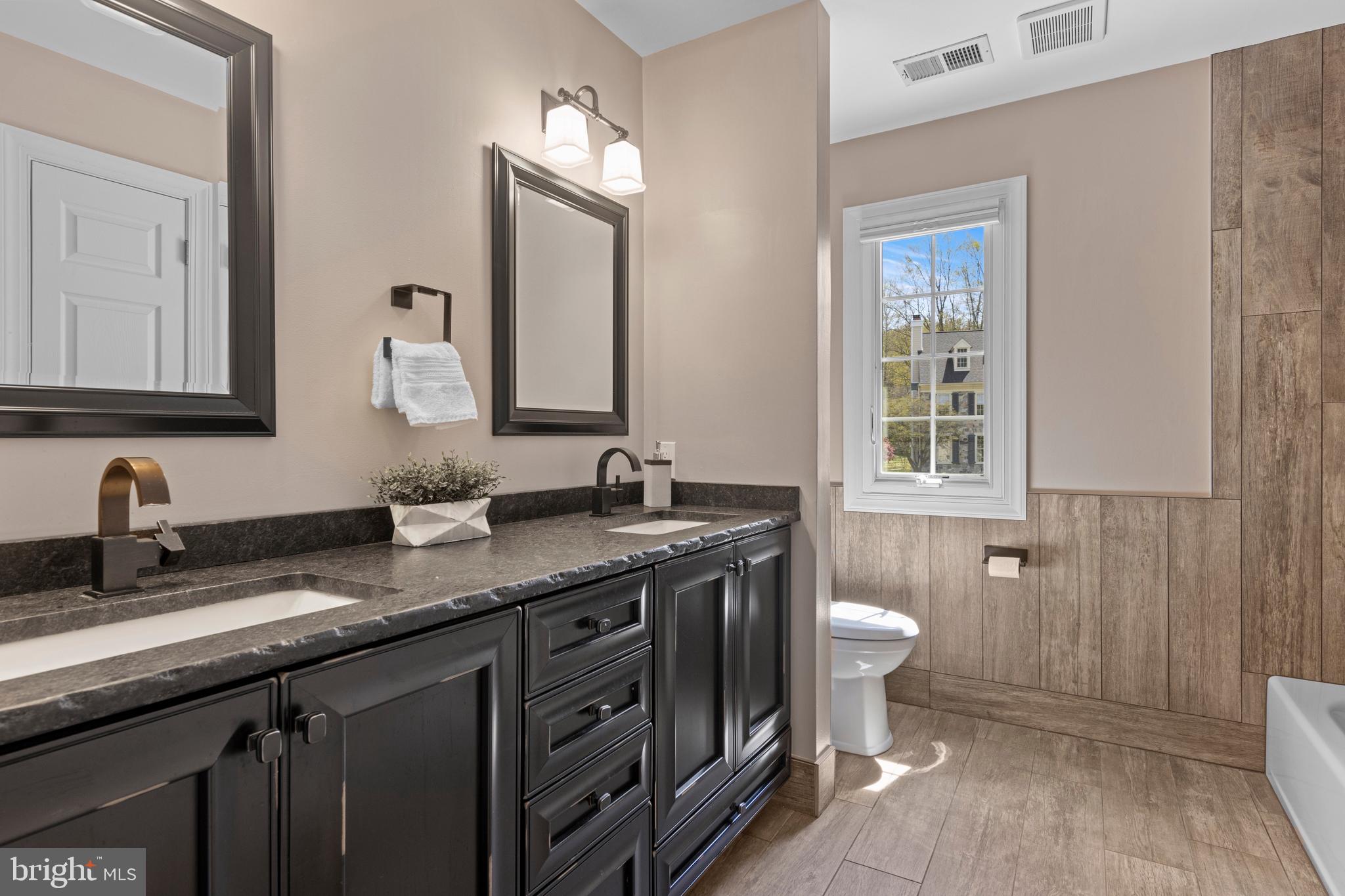 705 Turnbridge Road Wayne, PA 19087 - Photo 71 of 84 All new hall bath! Plank tile and double vanity!