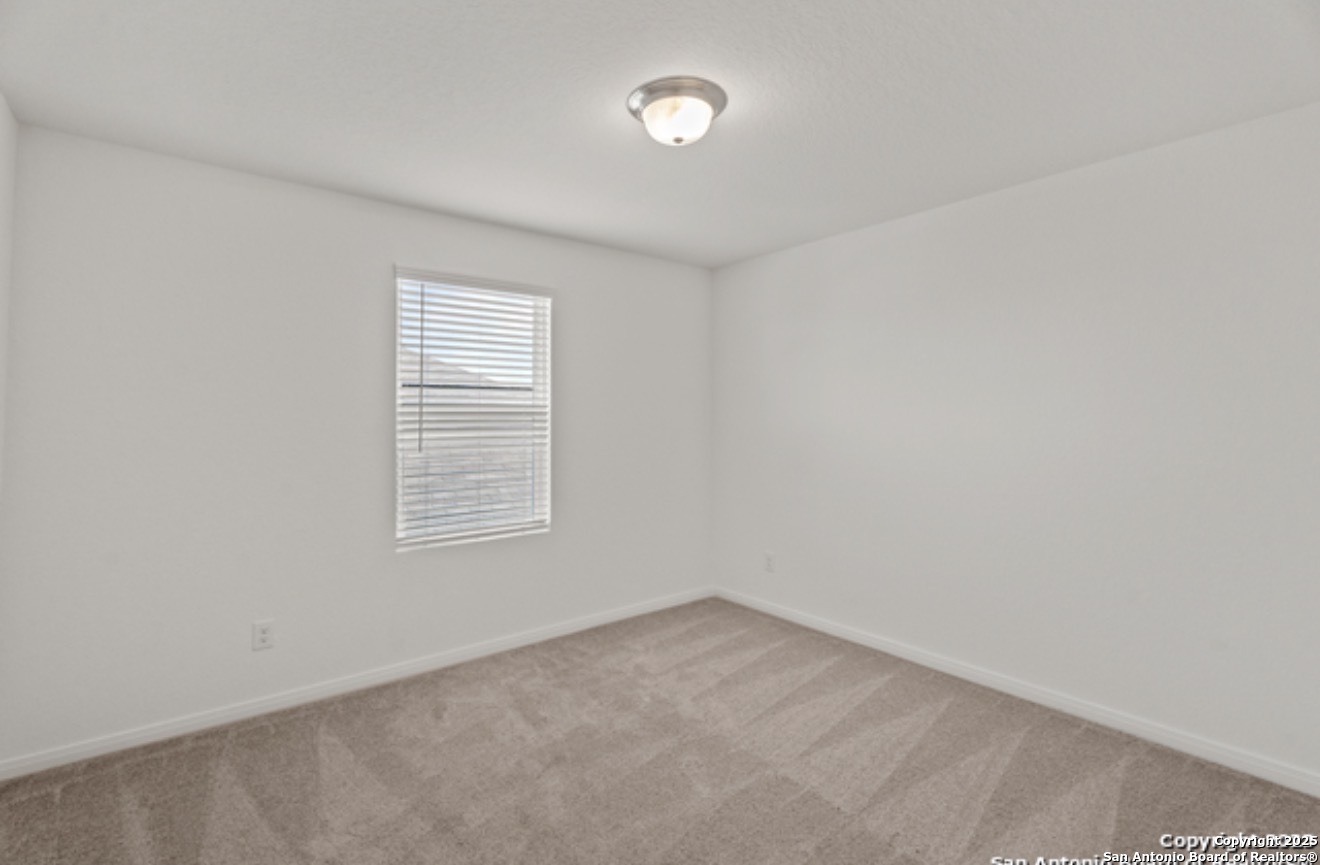 14677 Maple Terrace San Antonio, TX 78253 - Photo 3 of 13 an empty room with a window