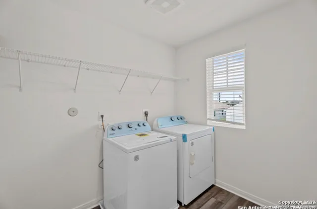 a utility room with dryer and washer