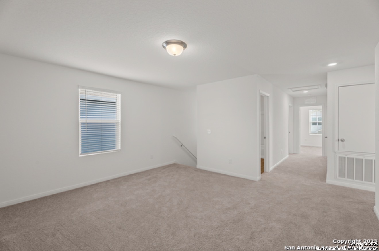 14677 Maple Terrace San Antonio, TX 78253 - Photo 10 of 13 a view of an empty room with a window