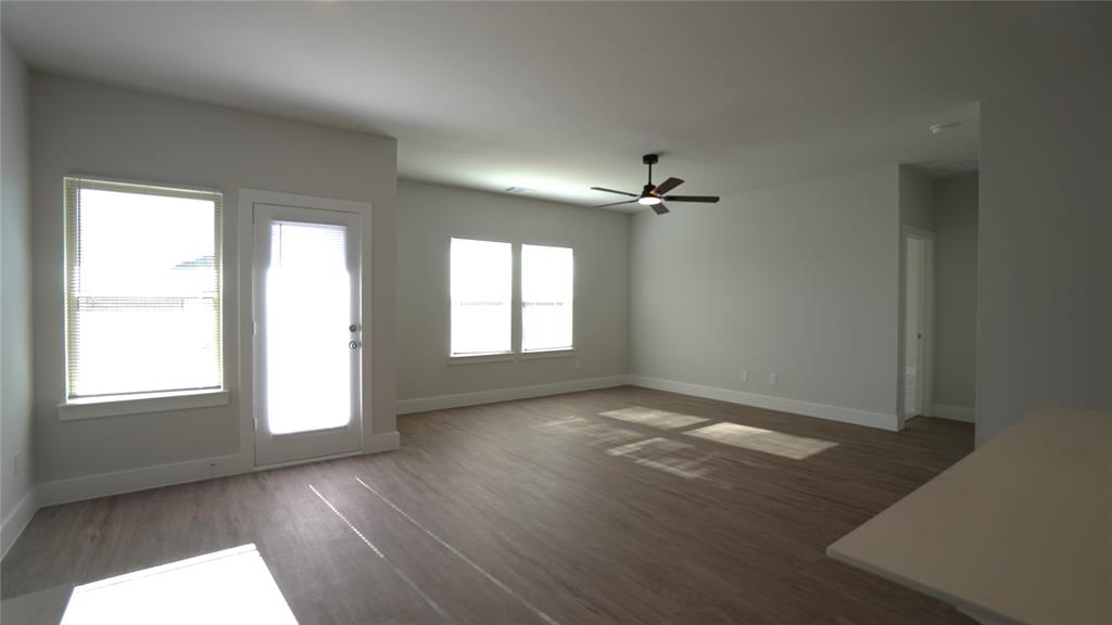 1374 Chisos Way Forney, TX 75126 - Photo 11 of 25 a view of an empty room with a window