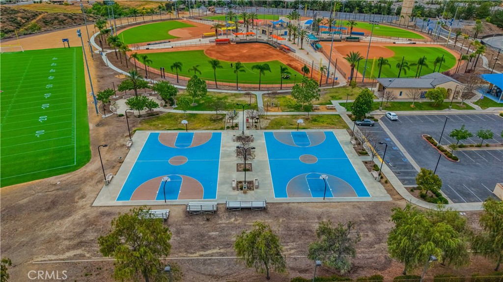 45015 Bronze Star Road Lake Elsinore, CA 92532 - Photo 49 of 50 an aerial view of a house with a garden and pool