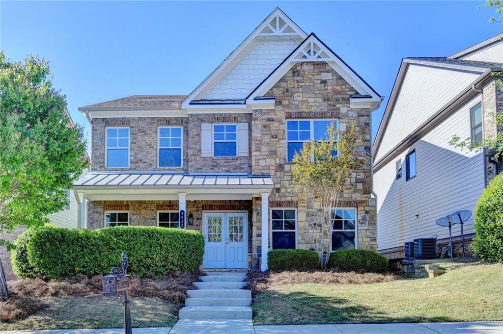 4032 Ridge Grove Way Suwanee, GA 30024 - Photo 2 of 75