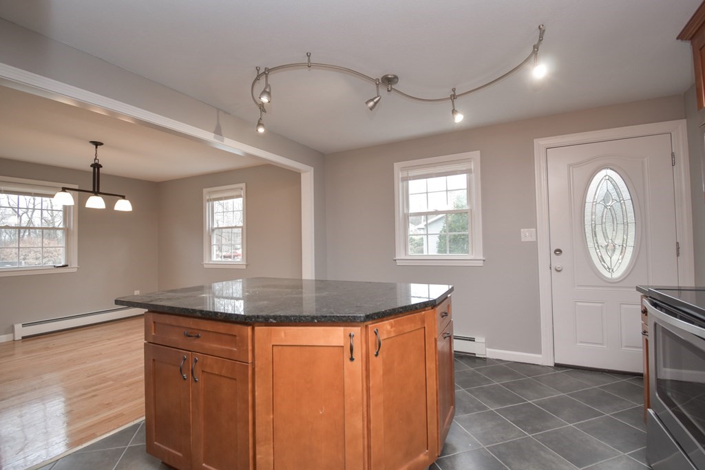 5 Northridge Road Westfield, MA 01085 - Photo 14 of 42 a view of kitchen with granite countertop furniture a sink a window and stainless steel appliances