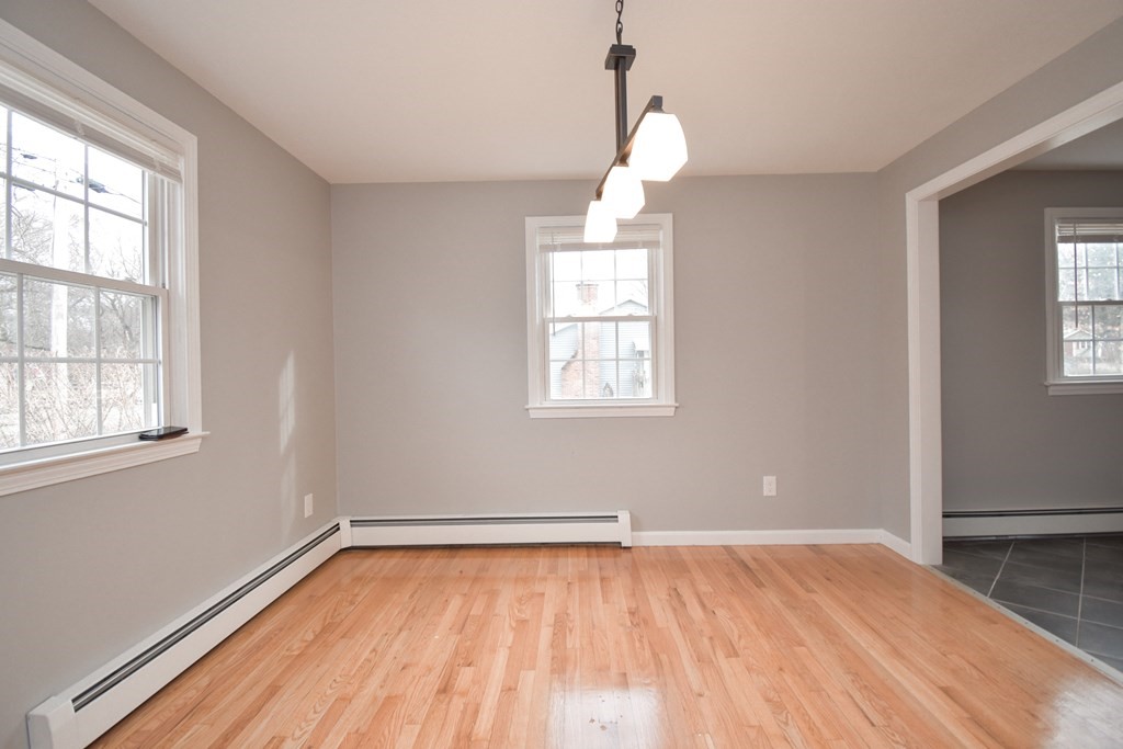 5 Northridge Road Westfield, MA 01085 - Photo 19 of 42 an empty room with wooden floor and windows