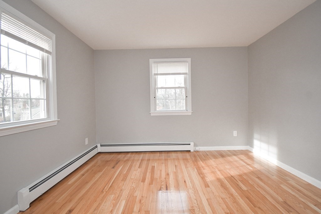 5 Northridge Road Westfield, MA 01085 - Photo 20 of 42 an empty room with wooden floor and windows