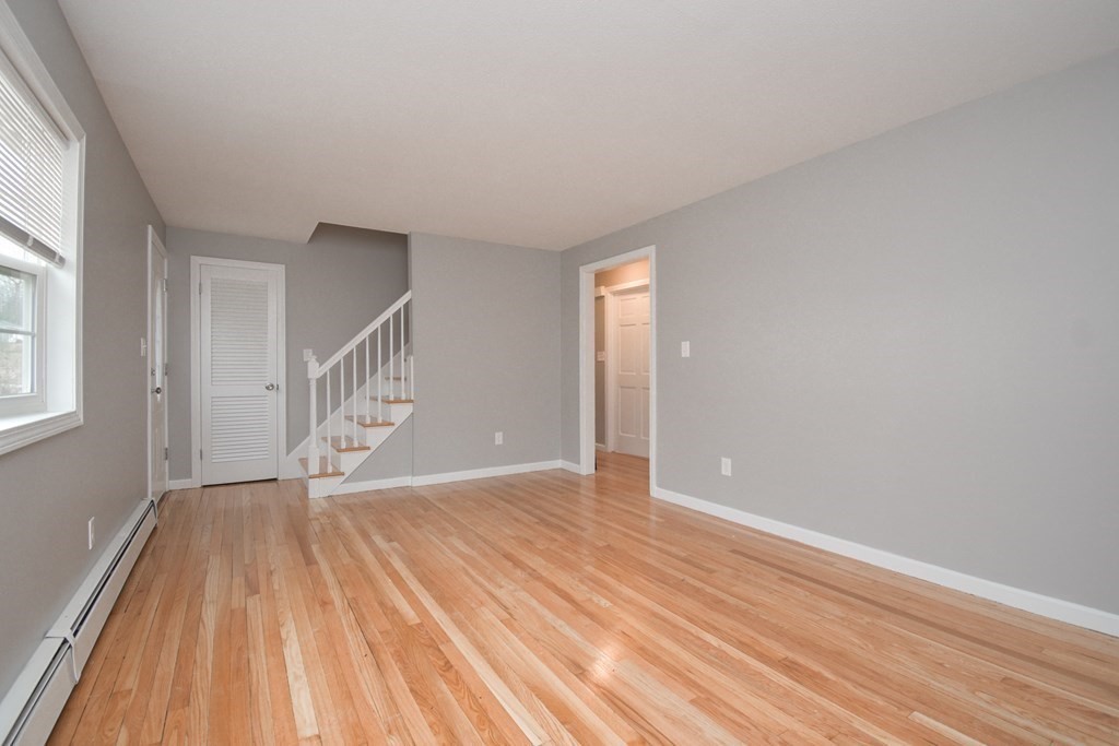 5 Northridge Road Westfield, MA 01085 - Photo 8 of 42 a view of empty room with wooden floor and fan