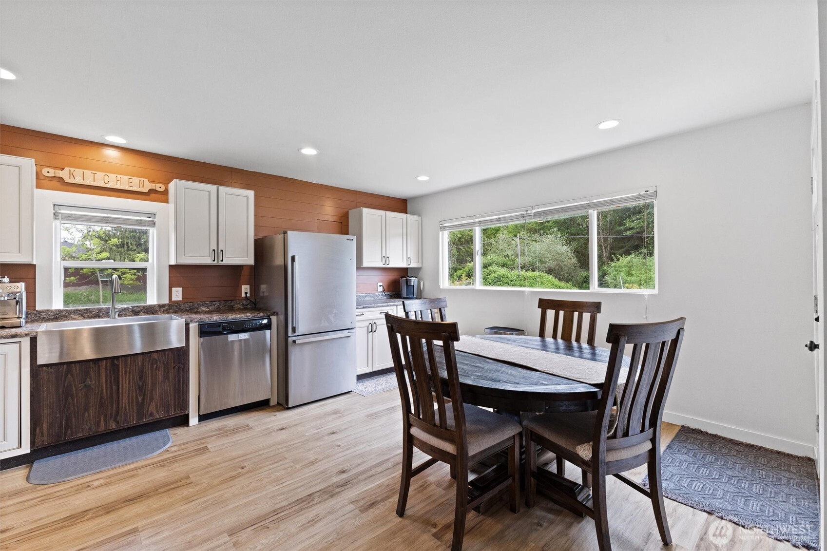 9007 Van Buren Road Everson, WA 98247 - Photo 12 of 36 a kitchen with a wooden table and chairs