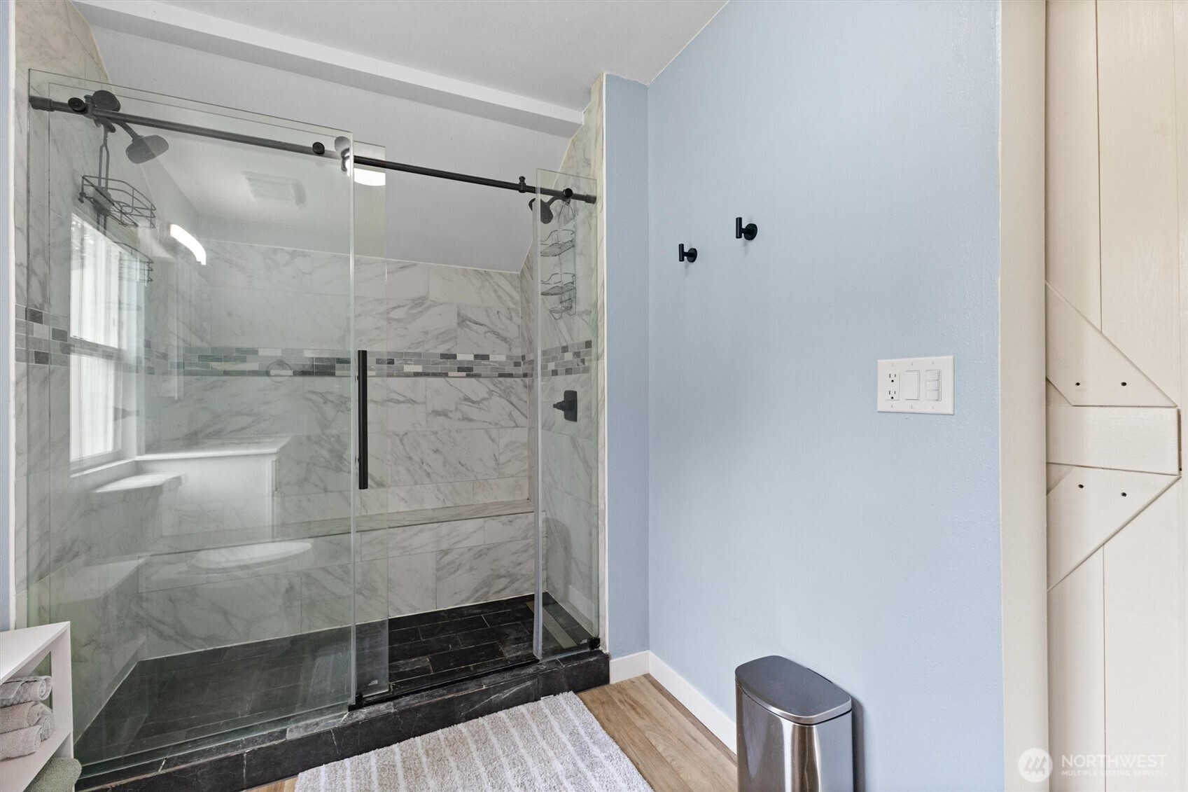 9007 Van Buren Road Everson, WA 98247 - Photo 16 of 36 a bathroom with a glass shower door