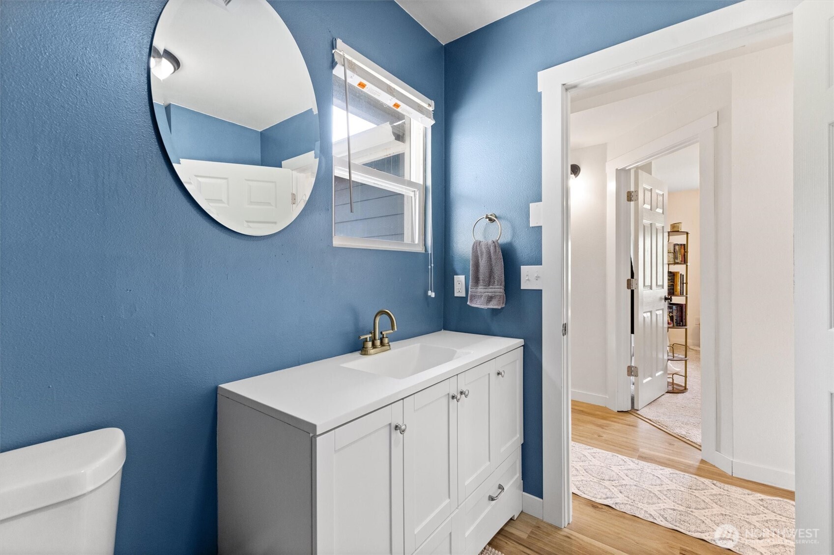 9007 Van Buren Road Everson, WA 98247 - Photo 22 of 36 a bathroom with a sink and a mirror