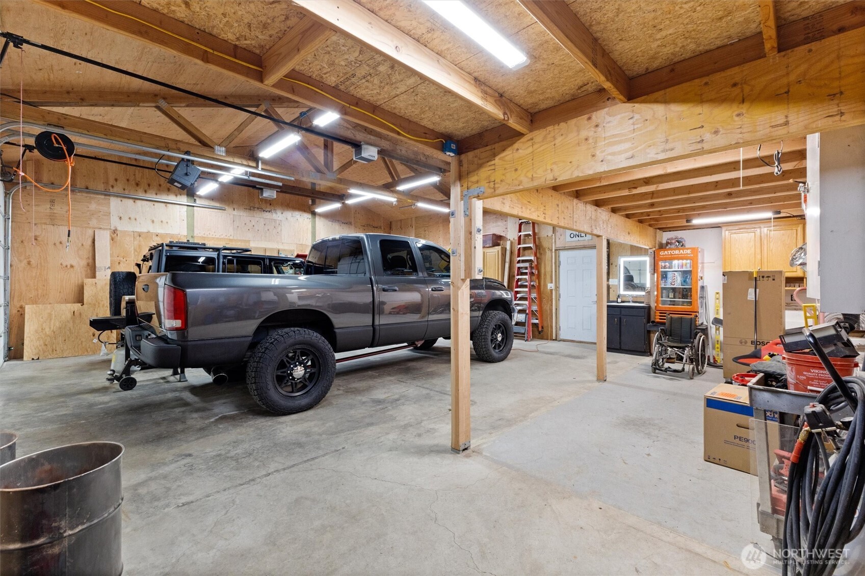 9007 Van Buren Road Everson, WA 98247 - Photo 27 of 36 a view of a garage with parked cars