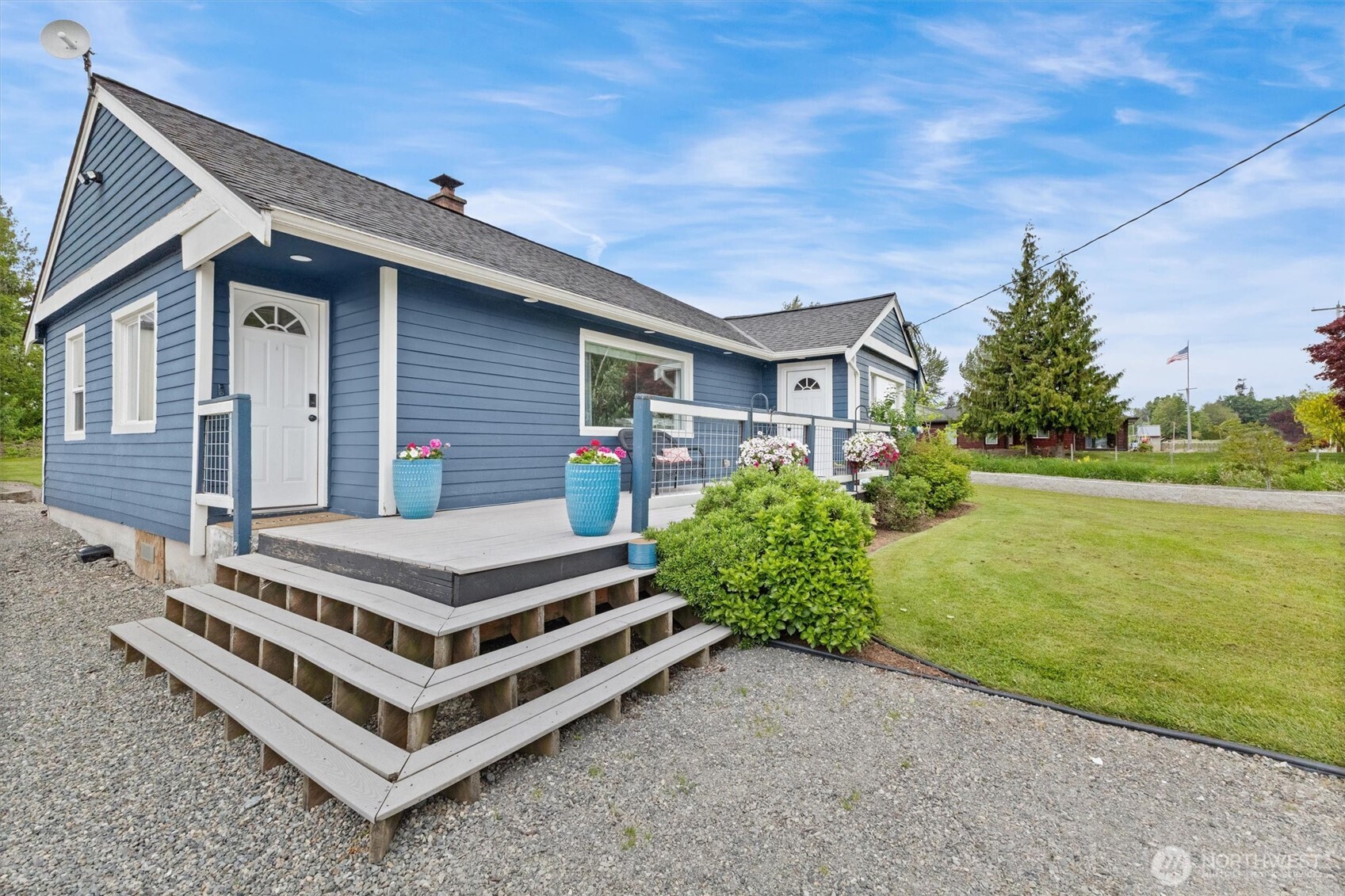 9007 Van Buren Road Everson, WA 98247 - Photo 3 of 36 a view of a house with a yard and deck