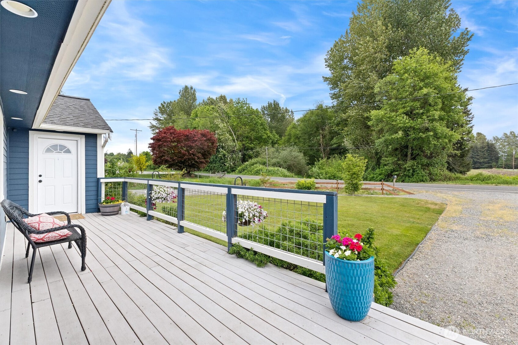 9007 Van Buren Road Everson, WA 98247 - Photo 31 of 36 a view of a chairs and table on the wooden deck