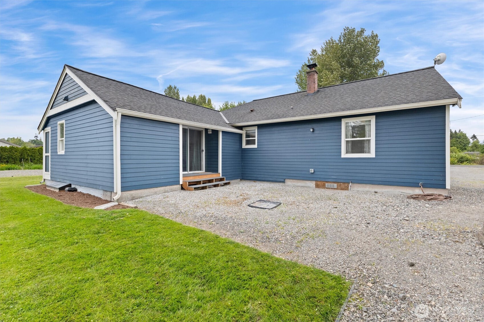9007 Van Buren Road Everson, WA 98247 - Photo 33 of 36 a front view of house with yard and trees
