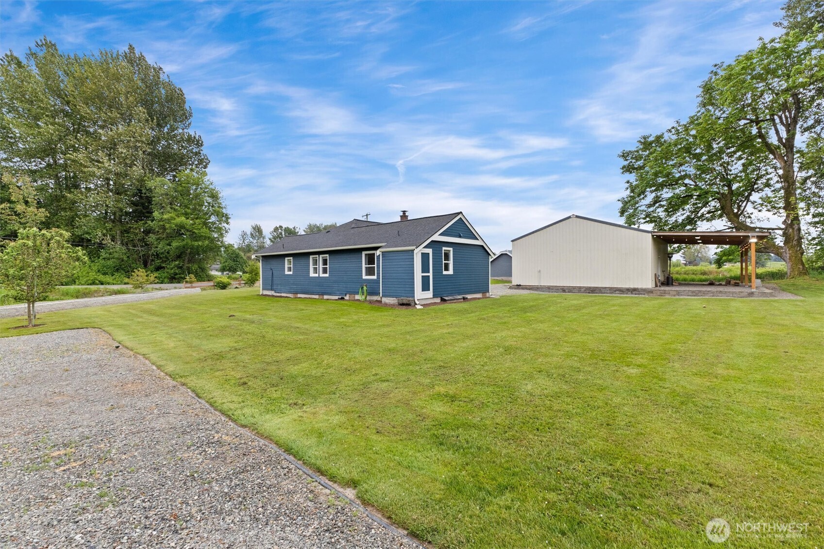 9007 Van Buren Road Everson, WA 98247 - Photo 34 of 36 a front view of house with yard and green space