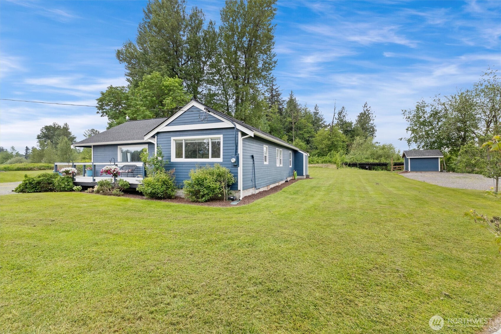 9007 Van Buren Road Everson, WA 98247 - Photo 4 of 36 a front view of a house with garden