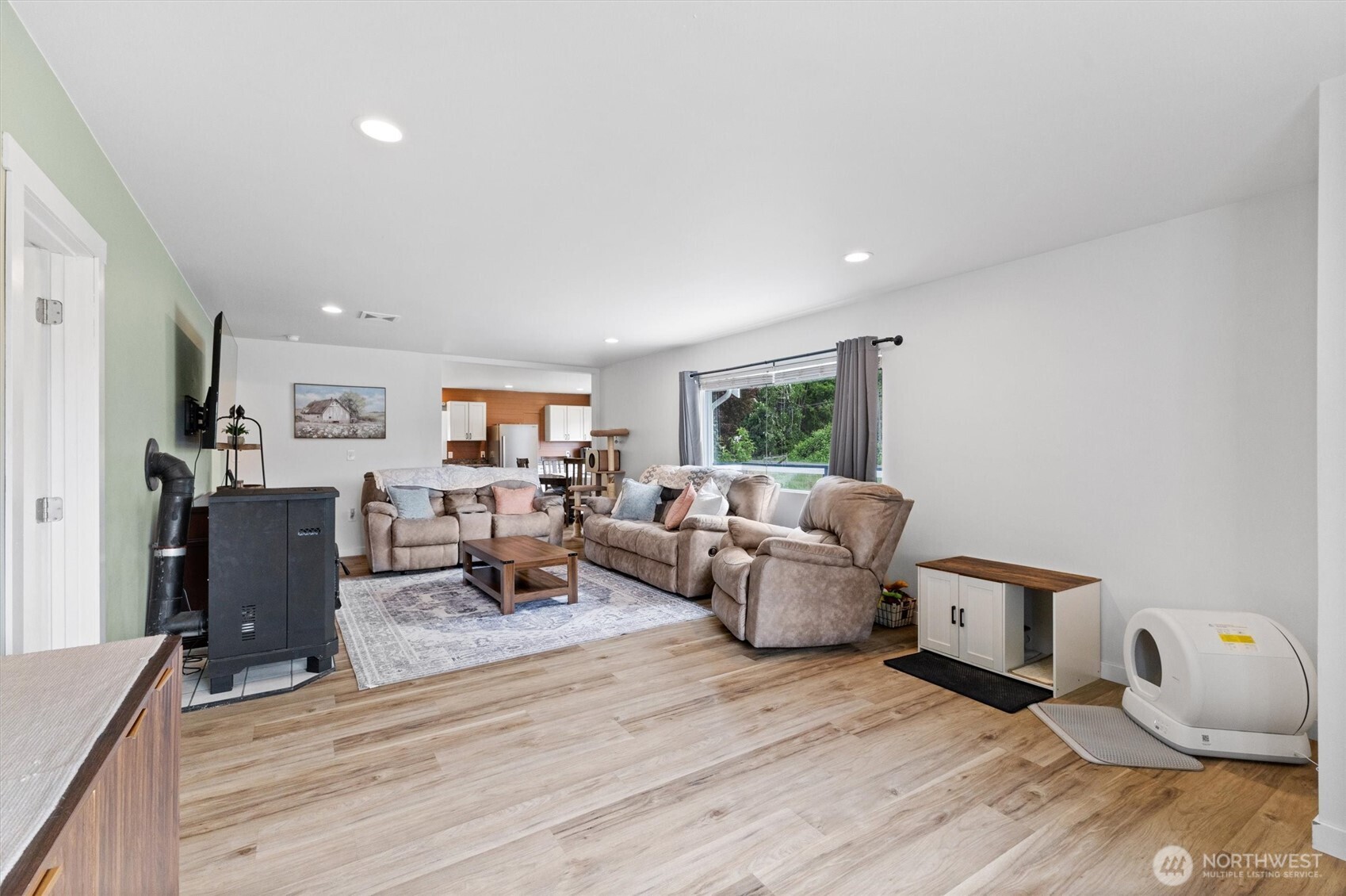 9007 Van Buren Road Everson, WA 98247 - Photo 7 of 36 a living room with furniture and a wooden floor