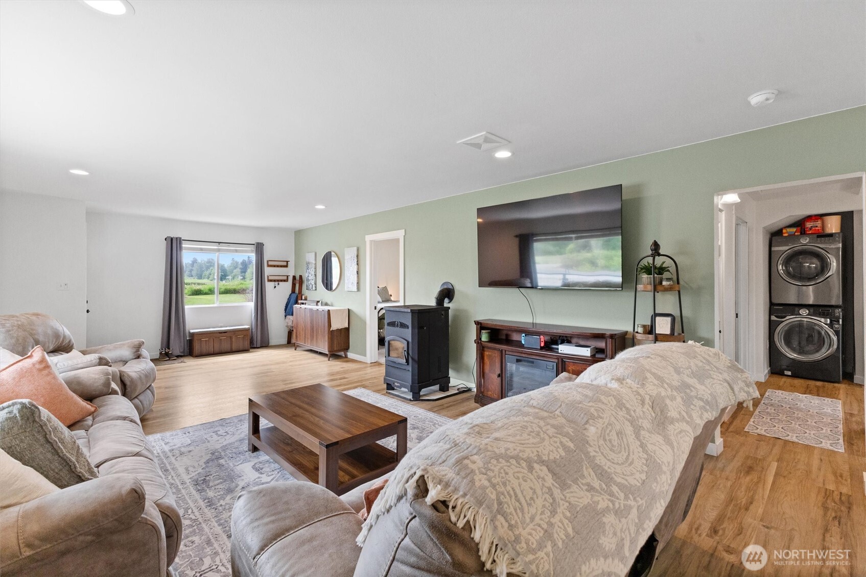9007 Van Buren Road Everson, WA 98247 - Photo 8 of 36 a living room with furniture and a flat screen tv