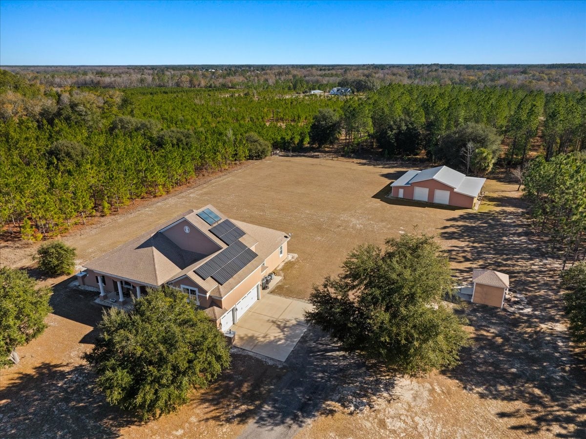 27247 Hallman Road Hilliard, FL 32046 - Photo 7 of 59 an aerial view of a house with a yard