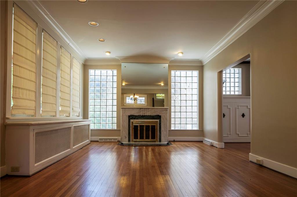 5616 Marlborough Road Pittsburgh, PA 15217 - Photo 5 of 23 Formal living room with decorative fireplace, recessed lighting...