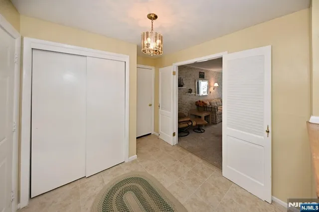 a view of a livingroom and a chandelier