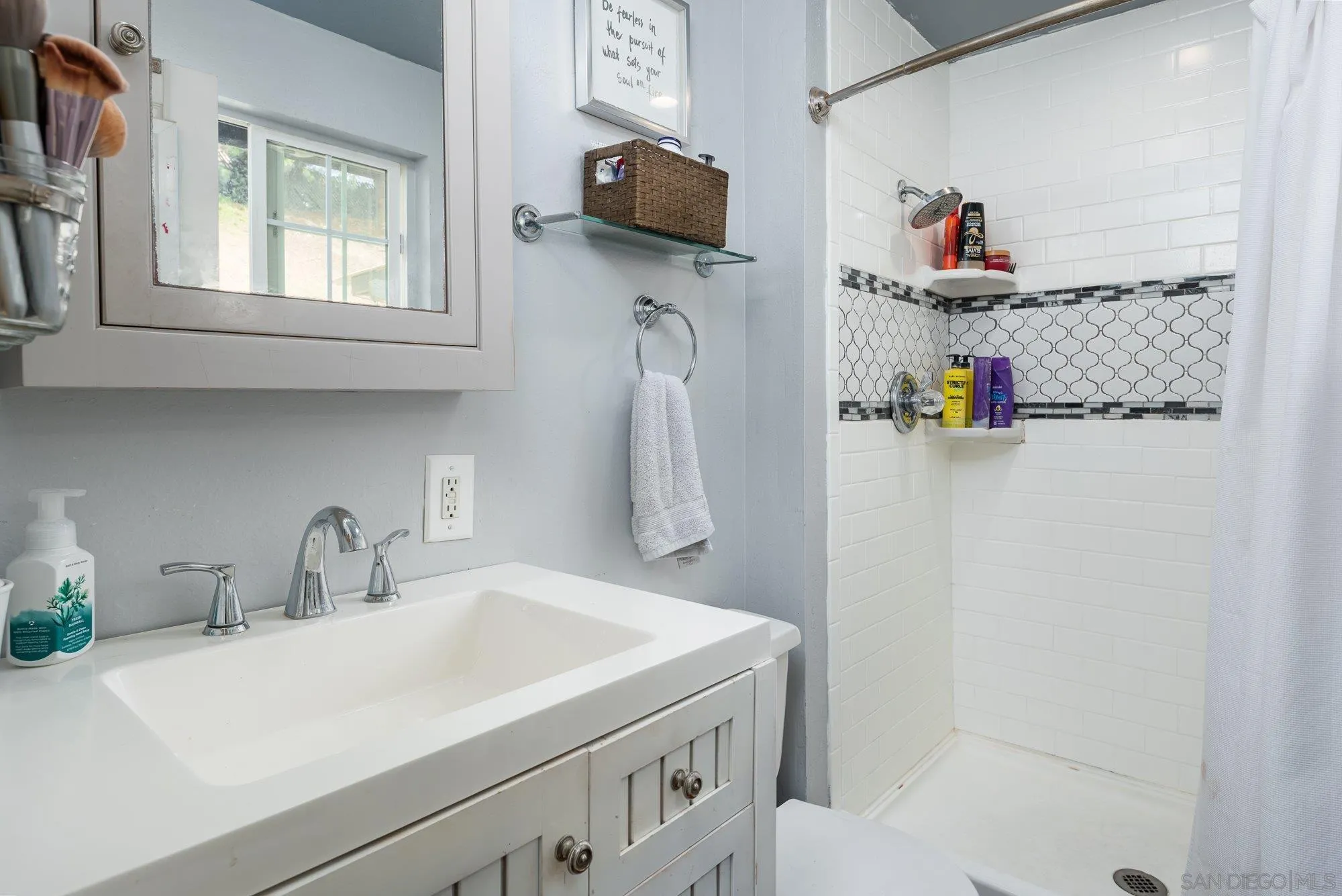 9357 Dempster Drive Santee, CA 92071 - Photo 17 of 35 a bathroom with a sink and a mirror