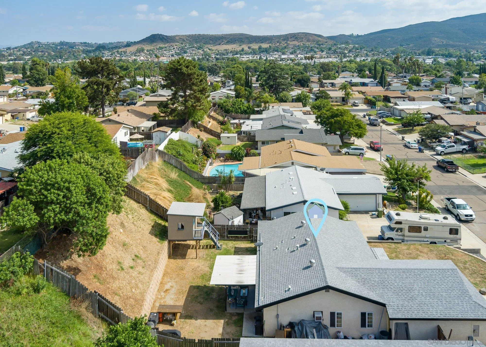 9357 Dempster Drive Santee, CA 92071 - Photo 25 of 35 an aerial view of residential houses with outdoor space