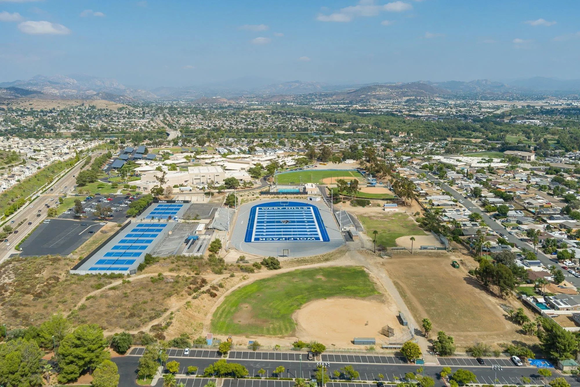 9357 Dempster Drive Santee, CA 92071 - Photo 29 of 35 an aerial view of residential houses with outdoor space