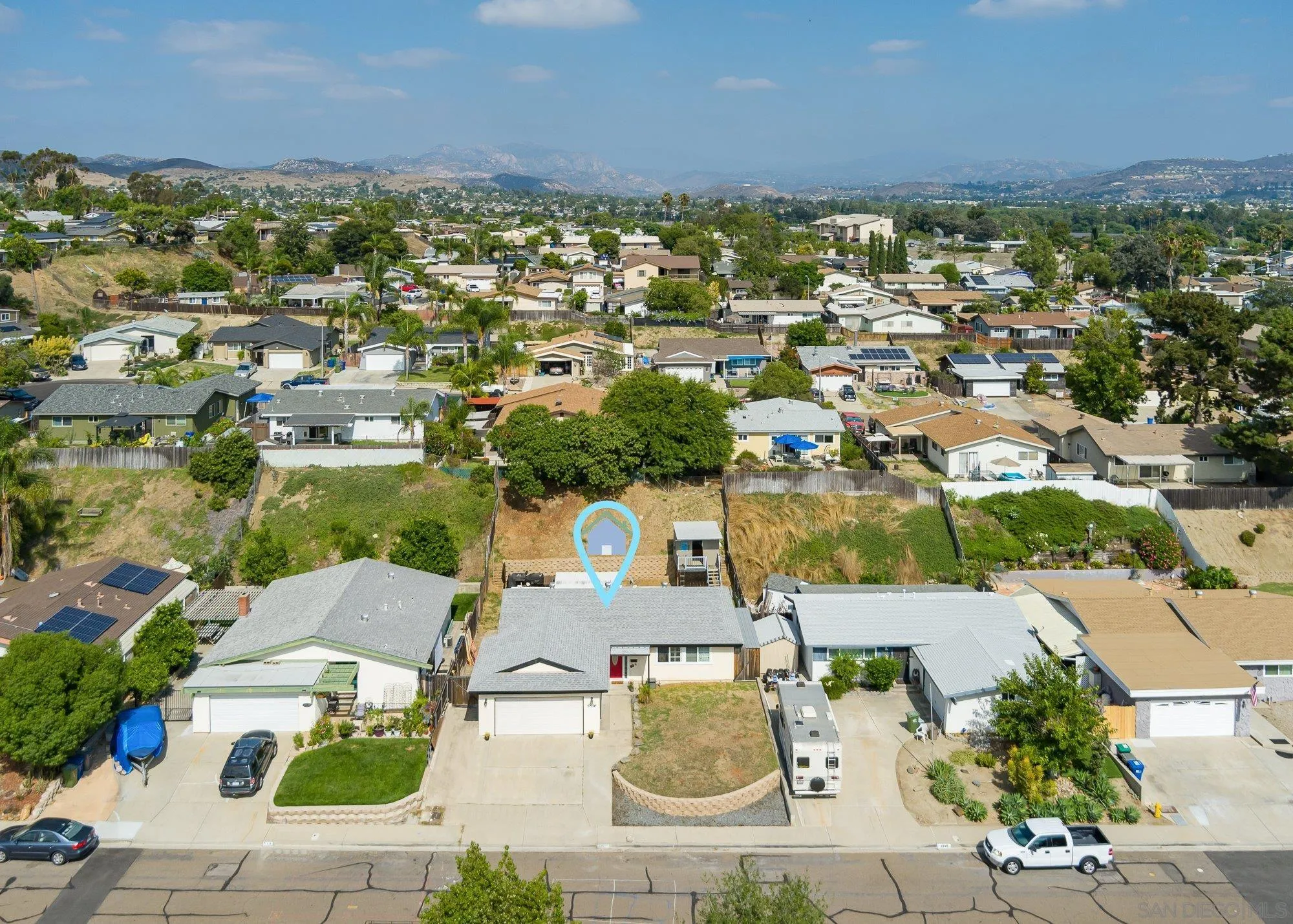 9357 Dempster Drive Santee, CA 92071 - Photo 4 of 35 an aerial view of residential houses with outdoor space